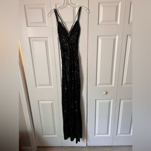 Junior prom dress. the brand is windsor and it is black sequins